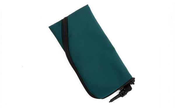 A Small Ghost Whale Pouch in Seapine Green (dark green).